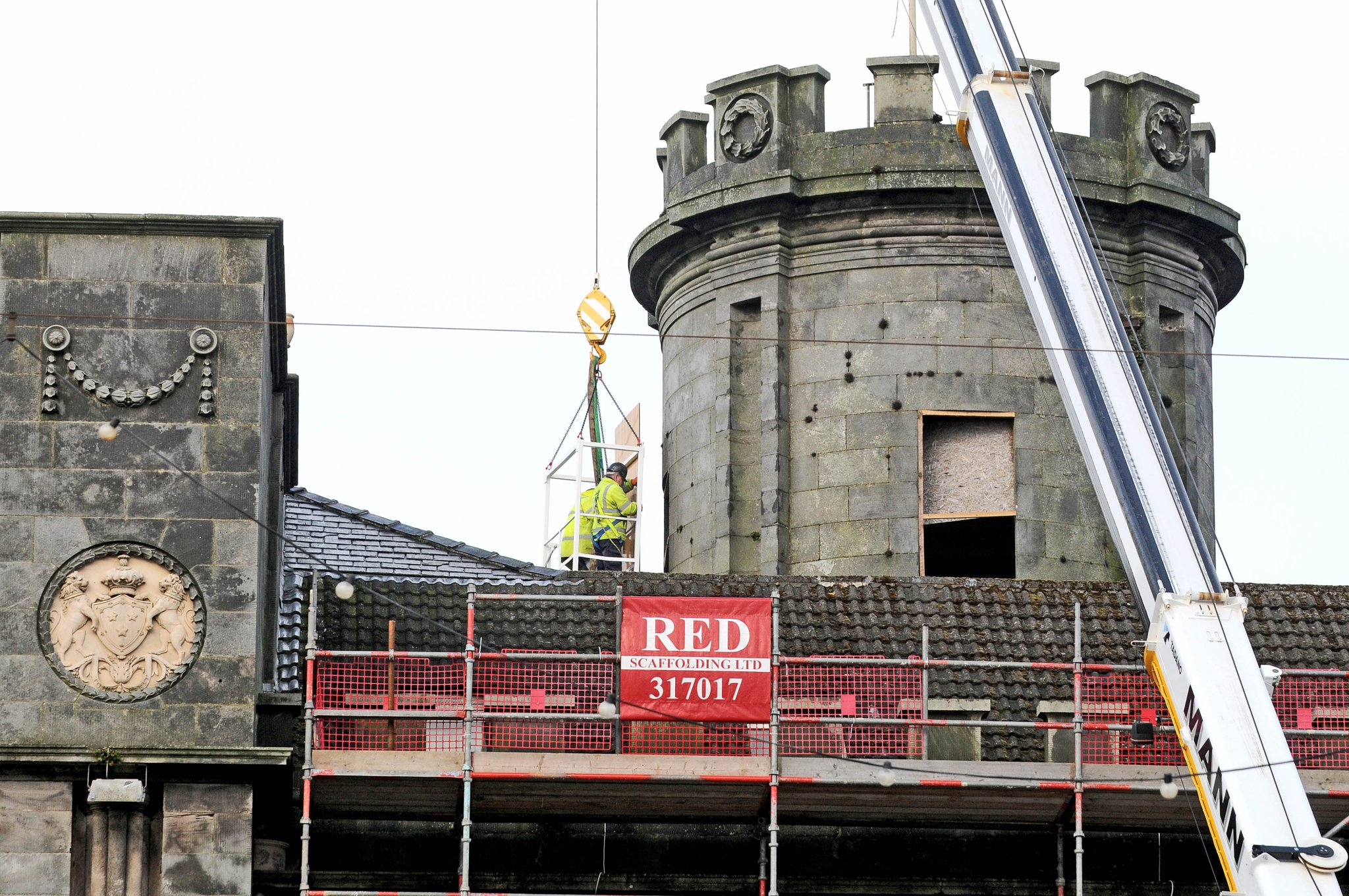 Work at the former Castle Mona Hotel to cover the windows around the central tower -