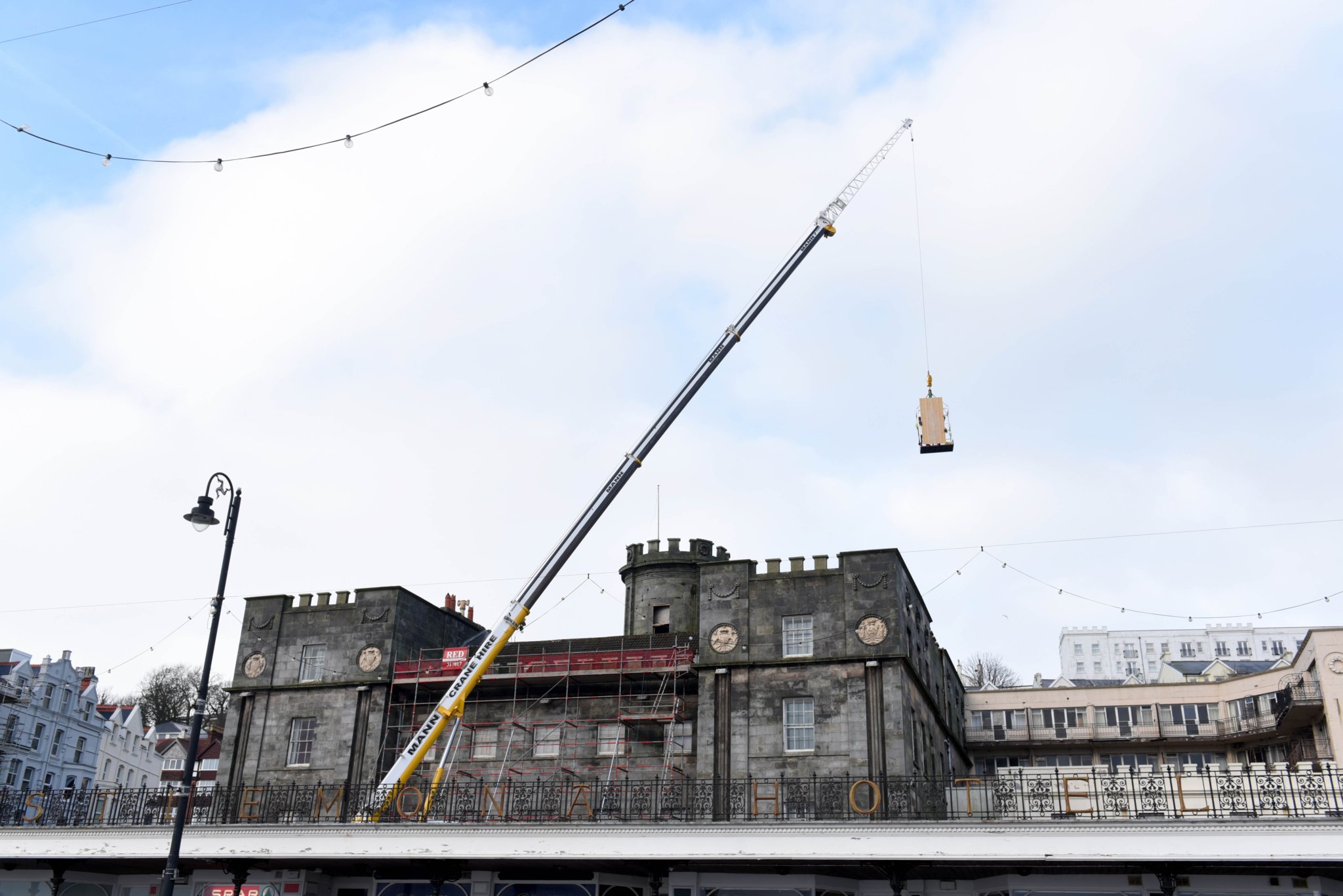 Work at the former Castle Mona Hotel to cover the windows around the central tower -