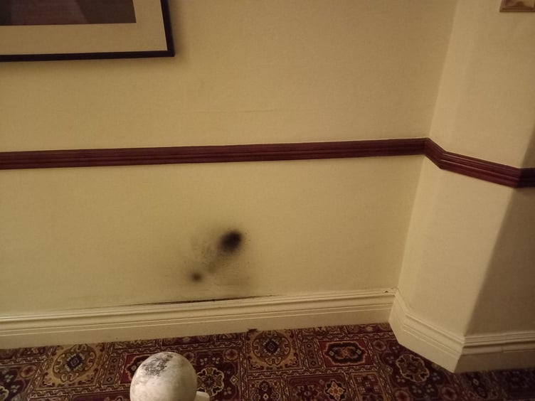 The scorch mark left on the wall of the property in Marine Parade, Peel by burning bike