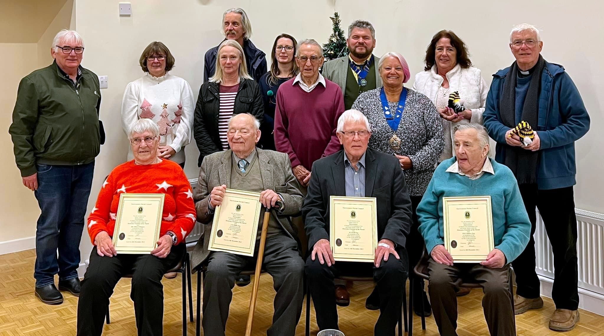 Front row, left to right, Hilary Rogers, George Hobbs, Alan Colwill and Ralph Carthew (not pictured  Arthur Bryant). Back row, left to right, county councillor Shorne Tilbey, Cllr Christine Myers, Cllr Greg Worden, Cllr Julie Phipps, Sheridon Rosser (clerk), Cllr Ken Boundy, Cllr Jonathan Hobbs, Cornwall Council chairman Cllr Pauline Giles, Sue Clancy-Gear and Rev Richard Ward-Smith