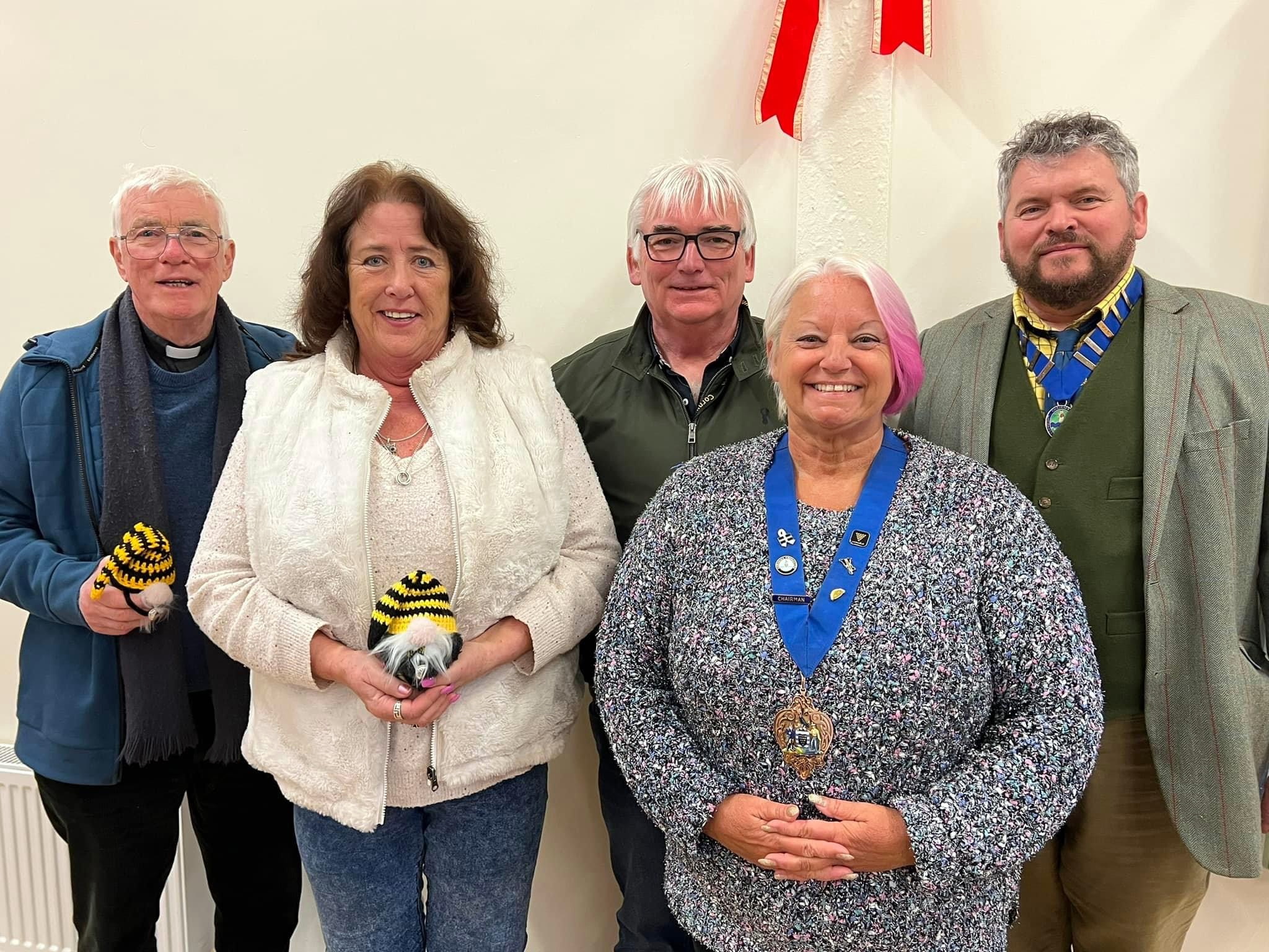 Front row, left to right, Hilary Rogers, George Hobbs, Alan Colwill and Ralph Carthew (not pictured  Arthur Bryant). Back row, left to right, county councillor Shorne Tilbey, Cllr Christine Myers, Cllr. Greg Worden, Cllr Julie Phipps, Sheridon Rosser (clerk), Cllr Ken Boundy, Cllr Jonathan Hobbs,  Cornwall Council chairman Cllr Pauline Giles, Sue Clancy-Gear and Rev Richard Ward-Smith
