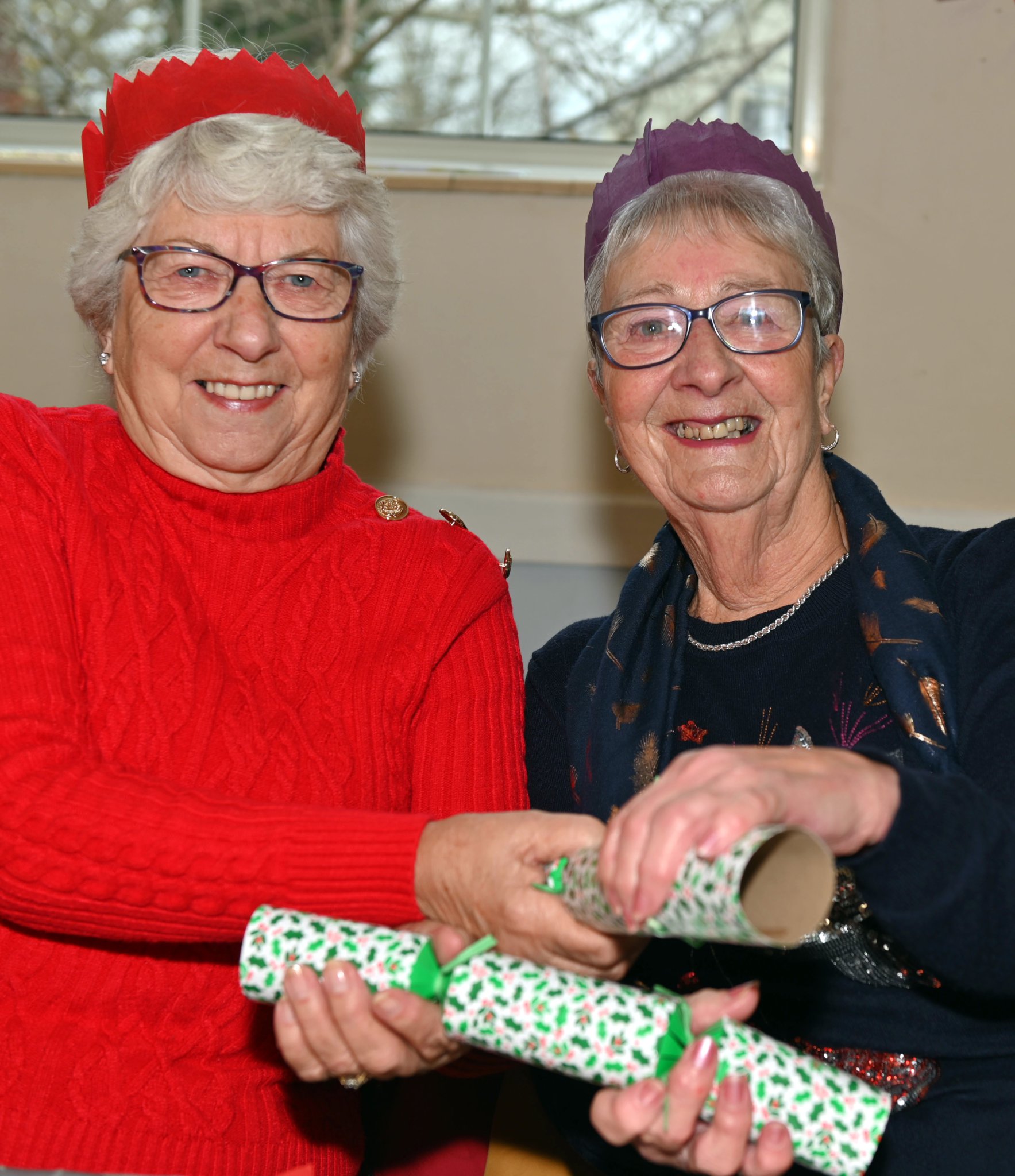 ABOVE: Best friends Stephanie Jasper and Di Pengelly; Left, In fine voice giving their rendition of some Christmas favourites are members of the Camelford Primary School Choir. Pictures: Adrian Jasper