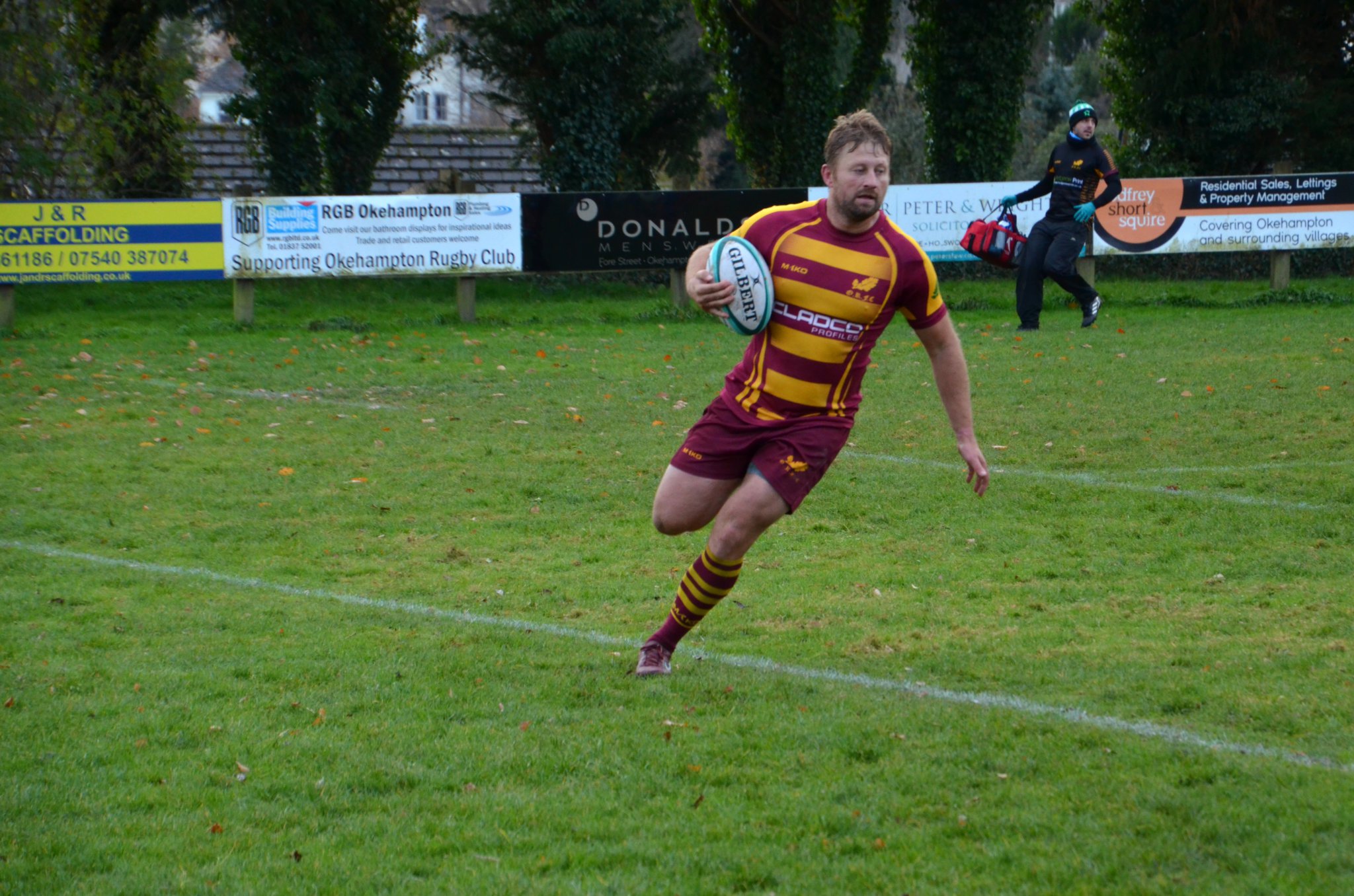 CLOCKWISE FROM ABOVE: Oke no 6 Saul Holliday crosses the try line to score; Oke defender makes a try saving tackle; Oke scrum-half Richie Bolt sprints over unopposed to score; Oke full-back Leon Horn scores in the corner; Oke captain Dan Fogerty sprints into the attack.