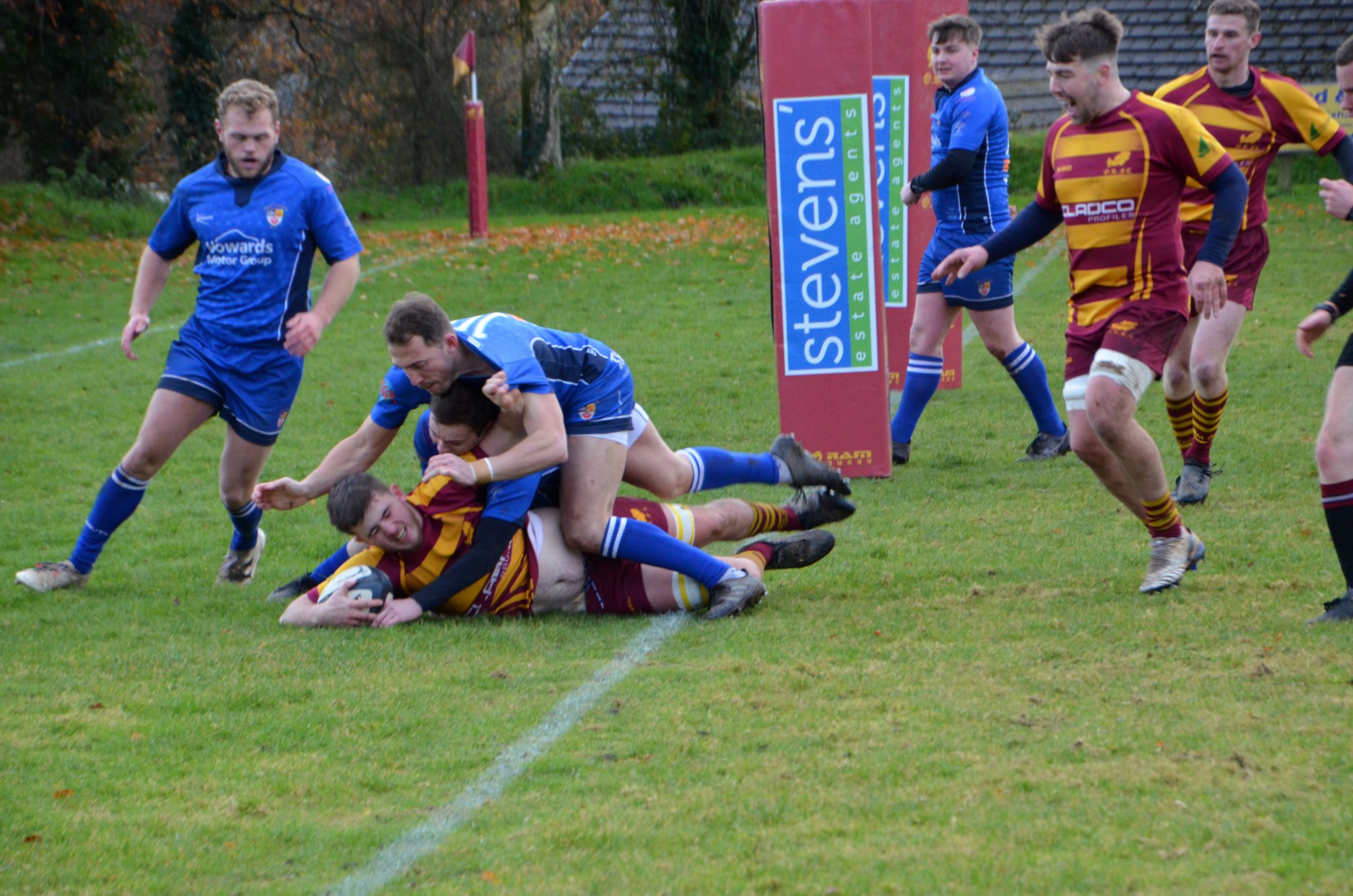 CLOCKWISE FROM ABOVE: Oke no 6 Saul Holliday crosses the try line to score; Oke defender makes a try saving tackle; Oke scrum-half Richie Bolt sprints over unopposed to score; Oke full-back Leon Horn scores in the corner; Oke captain Dan Fogerty sprints into the attack.