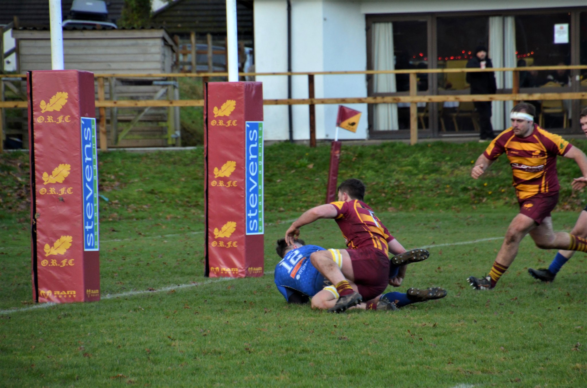CLOCKWISE FROM ABOVE: Oke no 6 Saul Holliday crosses the try line to score; Oke defender makes a try saving tackle; Oke scrum-half Richie Bolt sprints over unopposed to score; Oke full-back Leon Horn scores in the corner; Oke captain Dan Fogerty sprints into the attack.