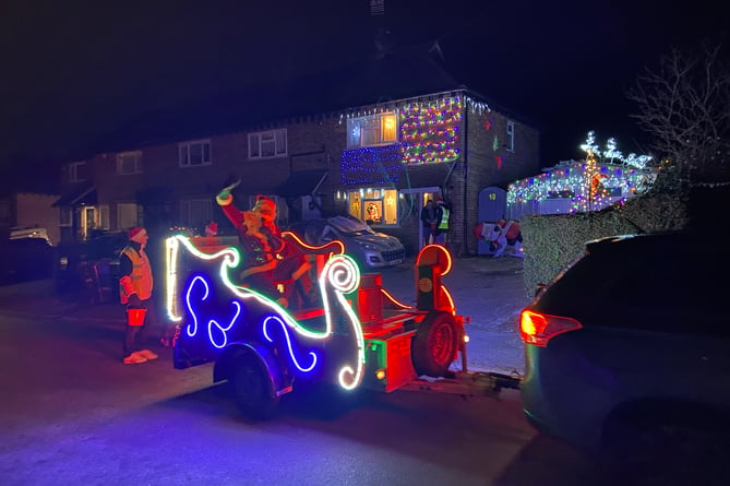 Father Christmas was spotted in north-west Farnham on his 2022 Santa's Sleigh tour in aid of Farnham Foodbank