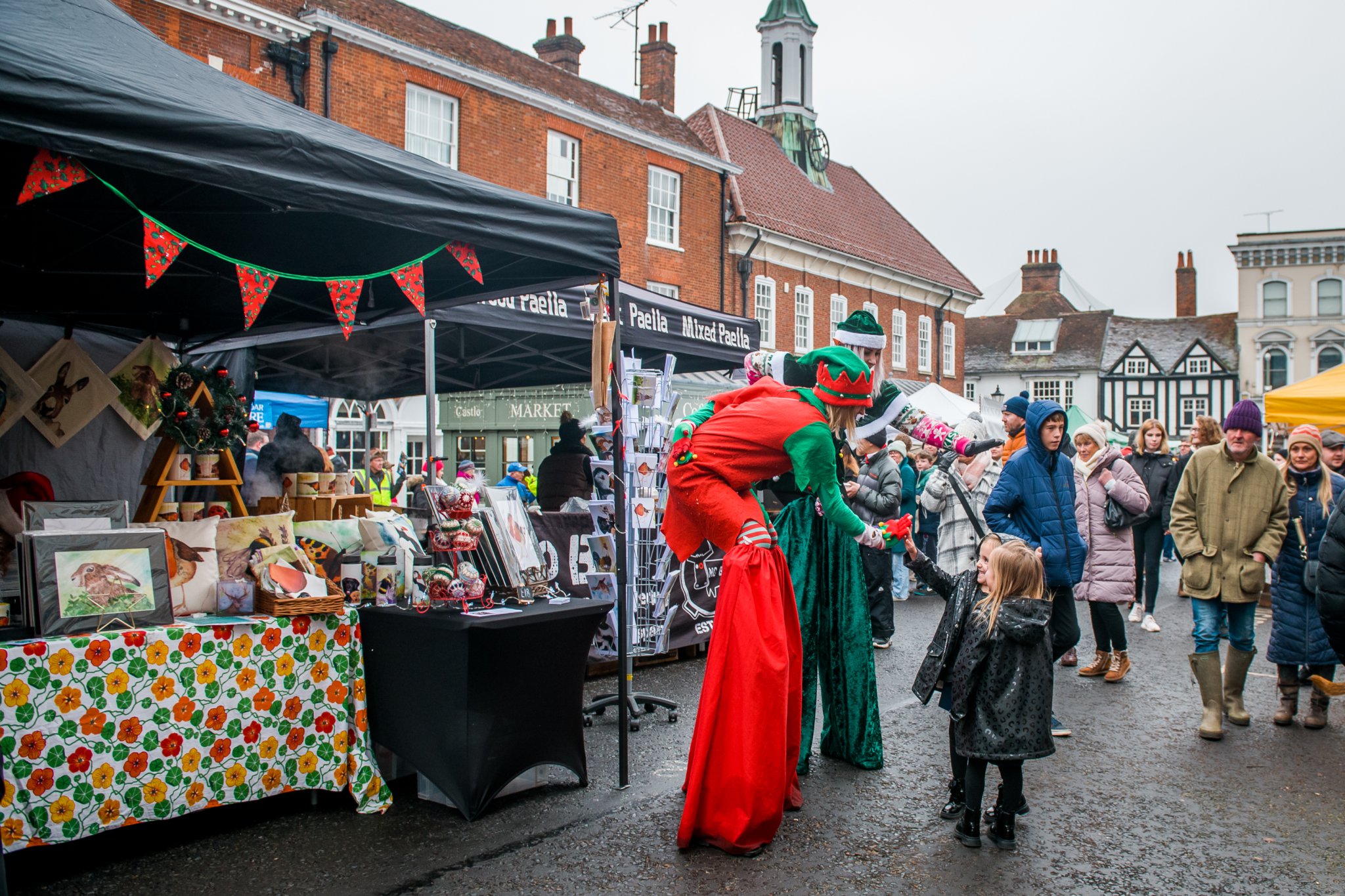 Elves on stilts entertained the crowds