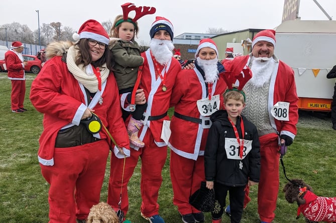 Ian Dawkins (pictured far right) and his Hi-Speed Services team again took part in Phyllis Tuckwell’s Santa Fun Run at the Wavell School in Farnborough last Sunday – and have now agreed to fund ‘better quality’ Santa outfits for next year’s hospice fundraiser!