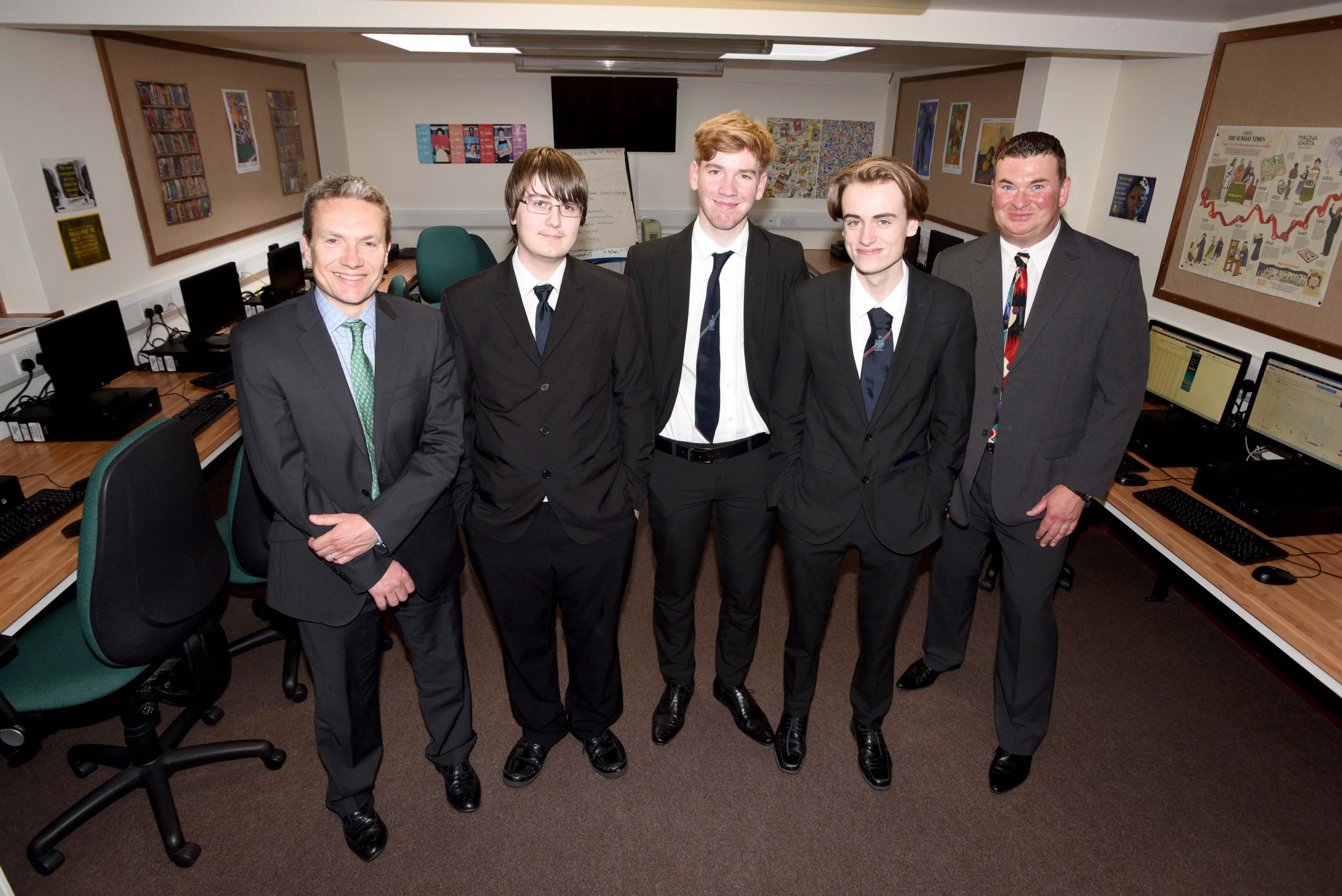 The Year 13 team from Castle Rushen High School who have taken part in the Shares4Schools competition - left to right: Chris Bell (Senior Investment Manager at Capital International), Callum Oates, James Costain, Duilleann Haywood and Jason Moorhouse (CRHS Economics teacher)