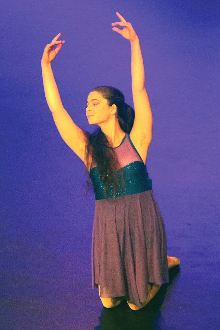 Woking College student Karis stepped in with her solo performance.