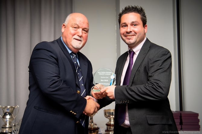Mike Gatting (left) presents Rowledge wicketkeeper Ben Wish with the award