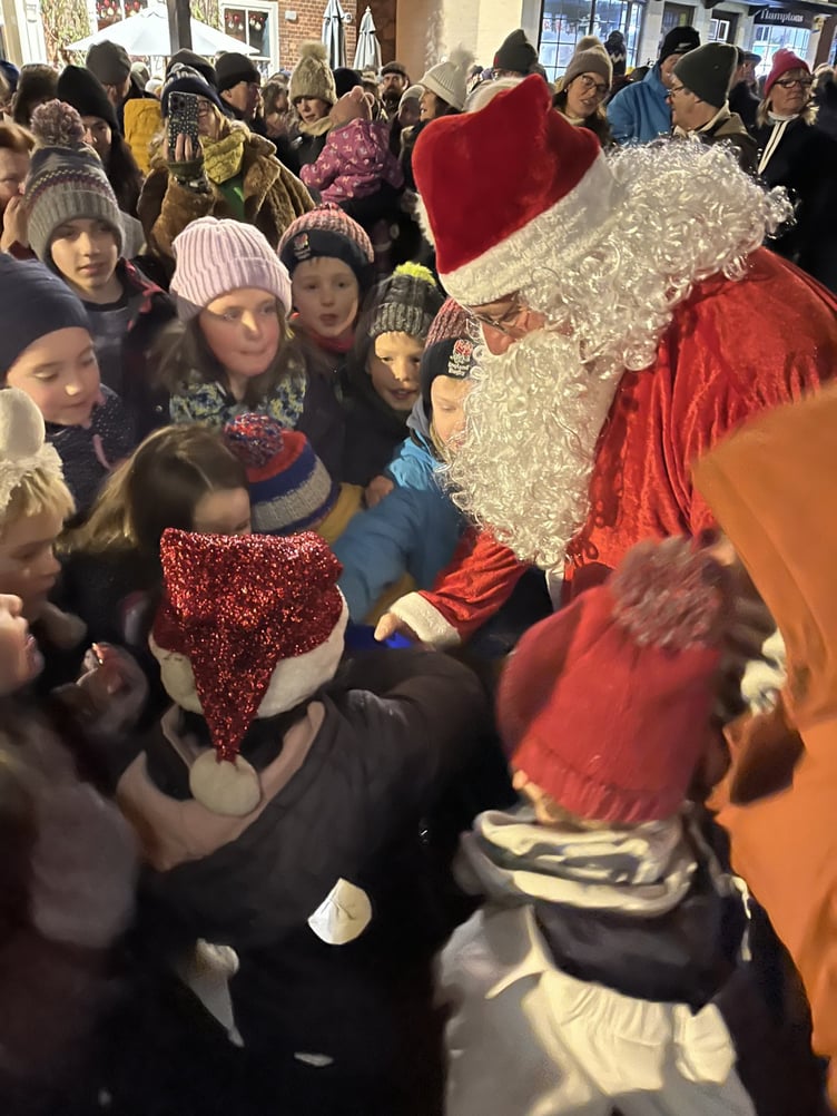 Father Christmas was popular at the carols around the Christmas tree event