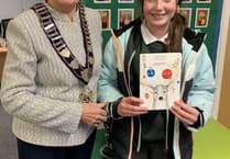 Haslemere mayor Jacquie Keen meets Christmas card competition winner