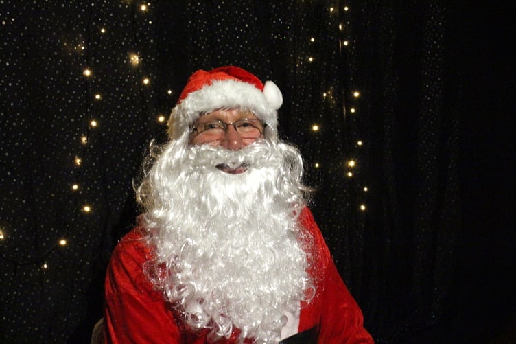 Father Christmas arrived early at Bow Christmas Market. SR 6474