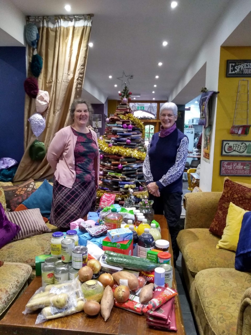 Tenby Soroptimists president Pam Maggs with Rebecca Rees at the Community Hub Café at the Old Chapel in Lower Frog Street.
