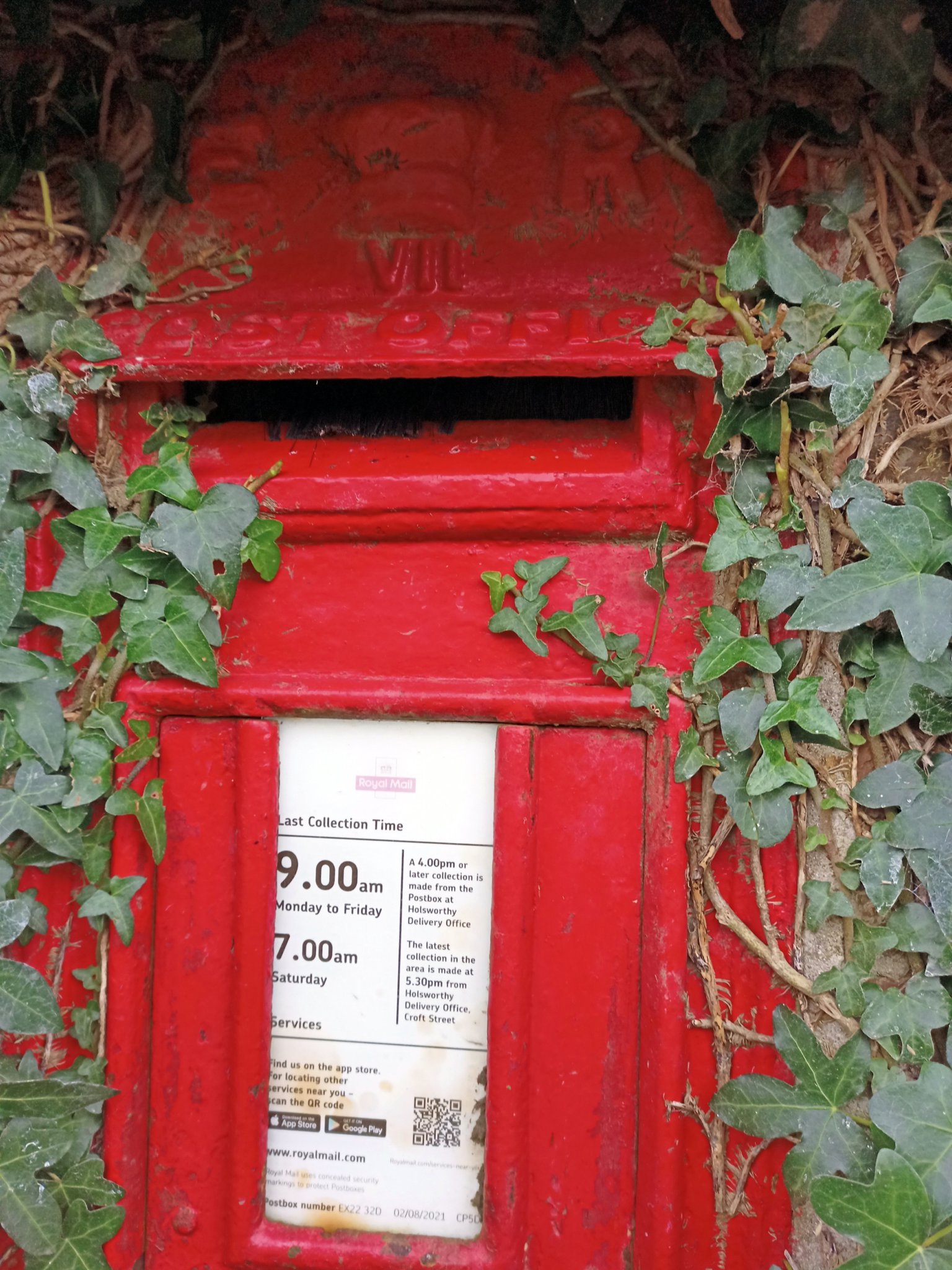 The Clawton post box embedded into the wall