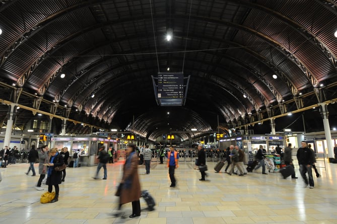 Commuters in Paddington Station, London the destination for Welsh rail travellers