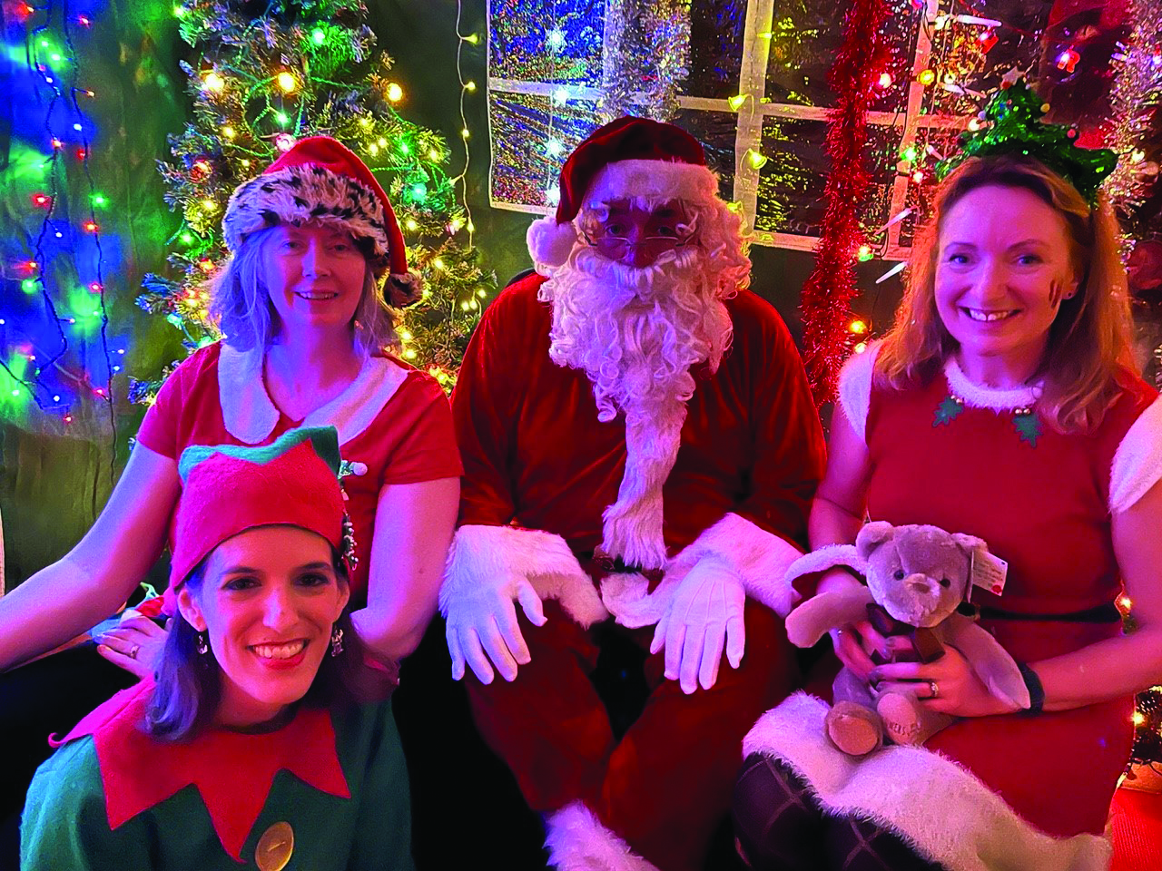 Santa and his elves take a well-earned breather.