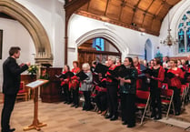 Choir proves on song for Woking charity