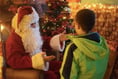 Father Christmas drops in to visit the children of Abergavenny at Bailey Park