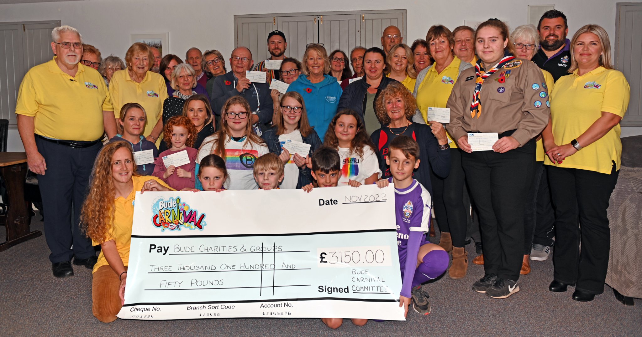 The committee are pictured with representatives of the local causes they supported this year. Picture: Adrian Jasper