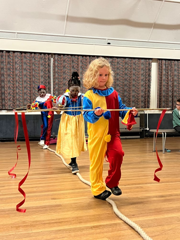 BALANCING ACT – Tightrope walkers Elsbeth, Onosa and Osayi.