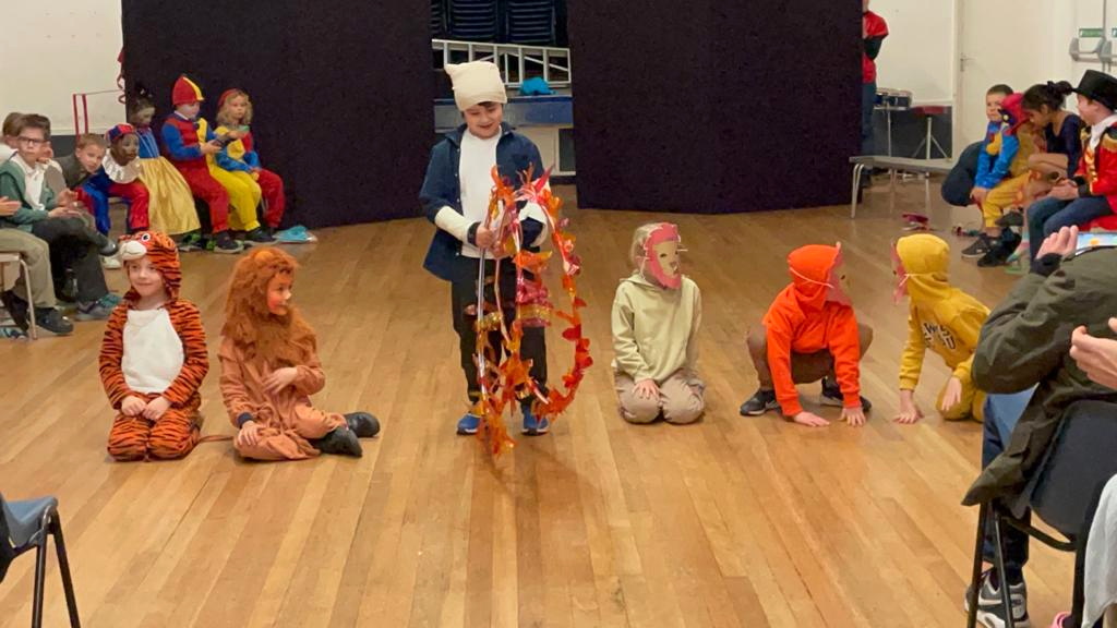 HOT STUFF – Rapha the lion tamer gets ready to put the big cats through their paces (and some fiery hoops).