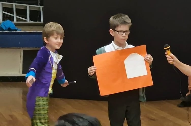 MAGIC – Theo the magician performs his wonders.