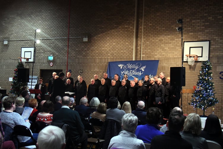 *** Local Caption *** Sam Britner with the choir
