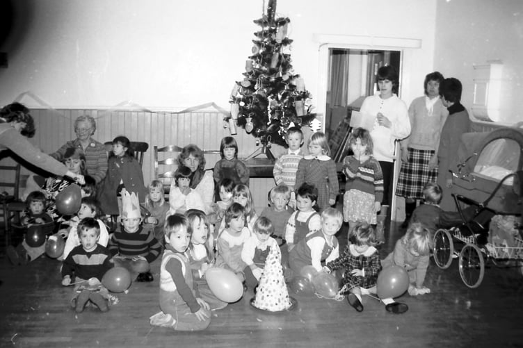 Pictured are children enjoying a party at Crediton Methodist Church in December 1987.