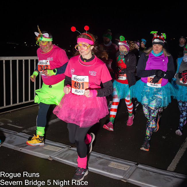 Runners were in festive mood as they headed across the old Severn Bridge. Photos: Tosh Simpkin.