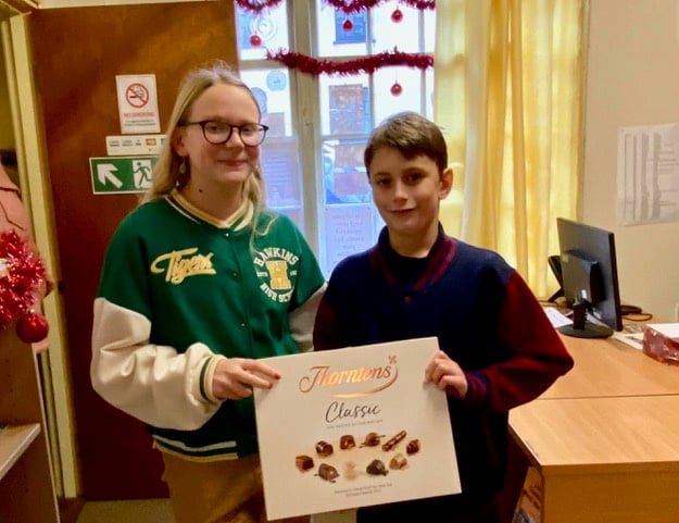 Third prizewinners in the Hidden Message competition were Fraser and Edie Clouston, pictured with their prize. NP 221222 01