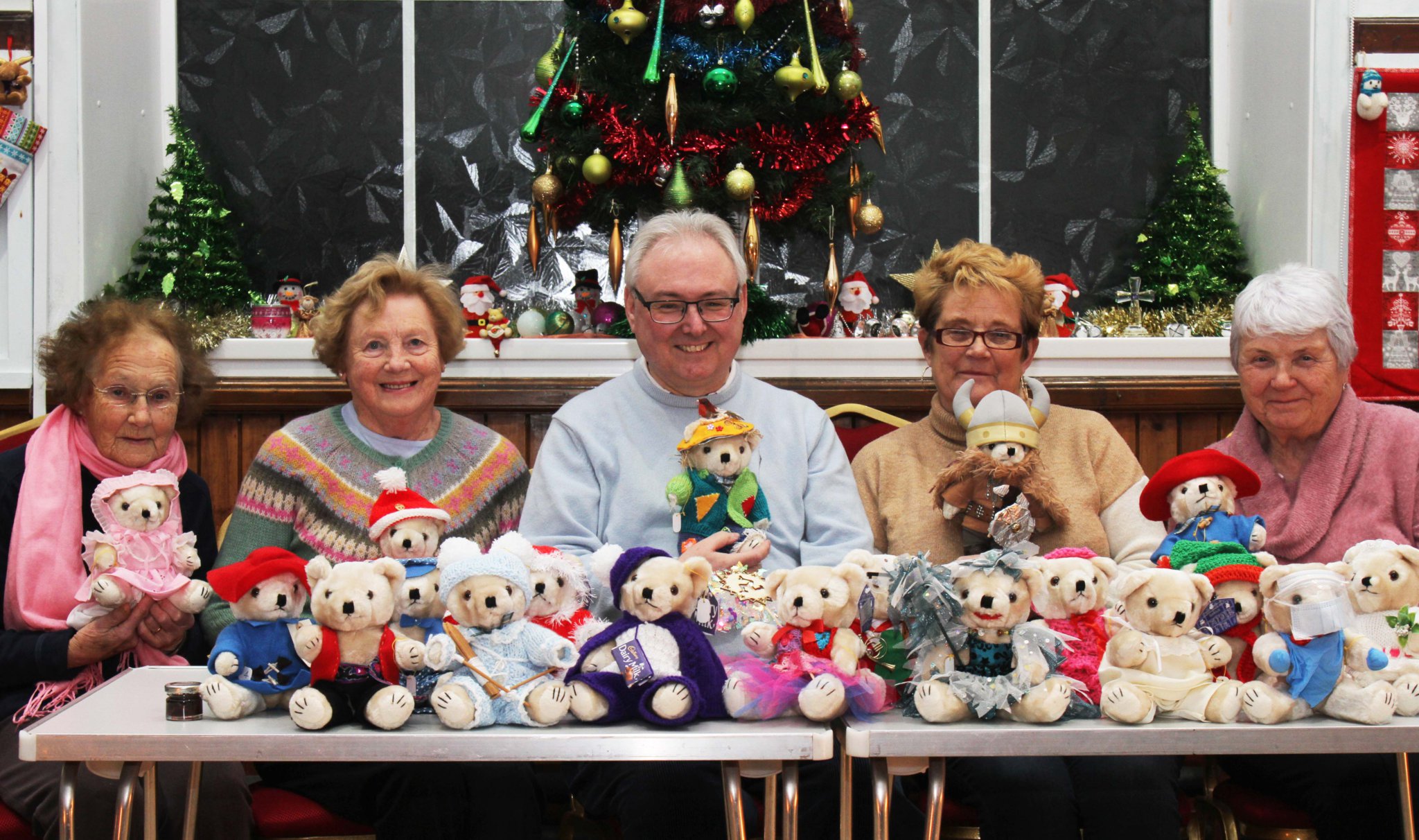 Port St Mary Methodist Church festive Bear Parade, pictured from left, Jean Karran, Muriel Nixon, Kevin Mort who judged the competition holding the winning bear dressed by Jill Dawson, Linn McKinley runner up and Elaine CrebbinPhoto: John Maddrell