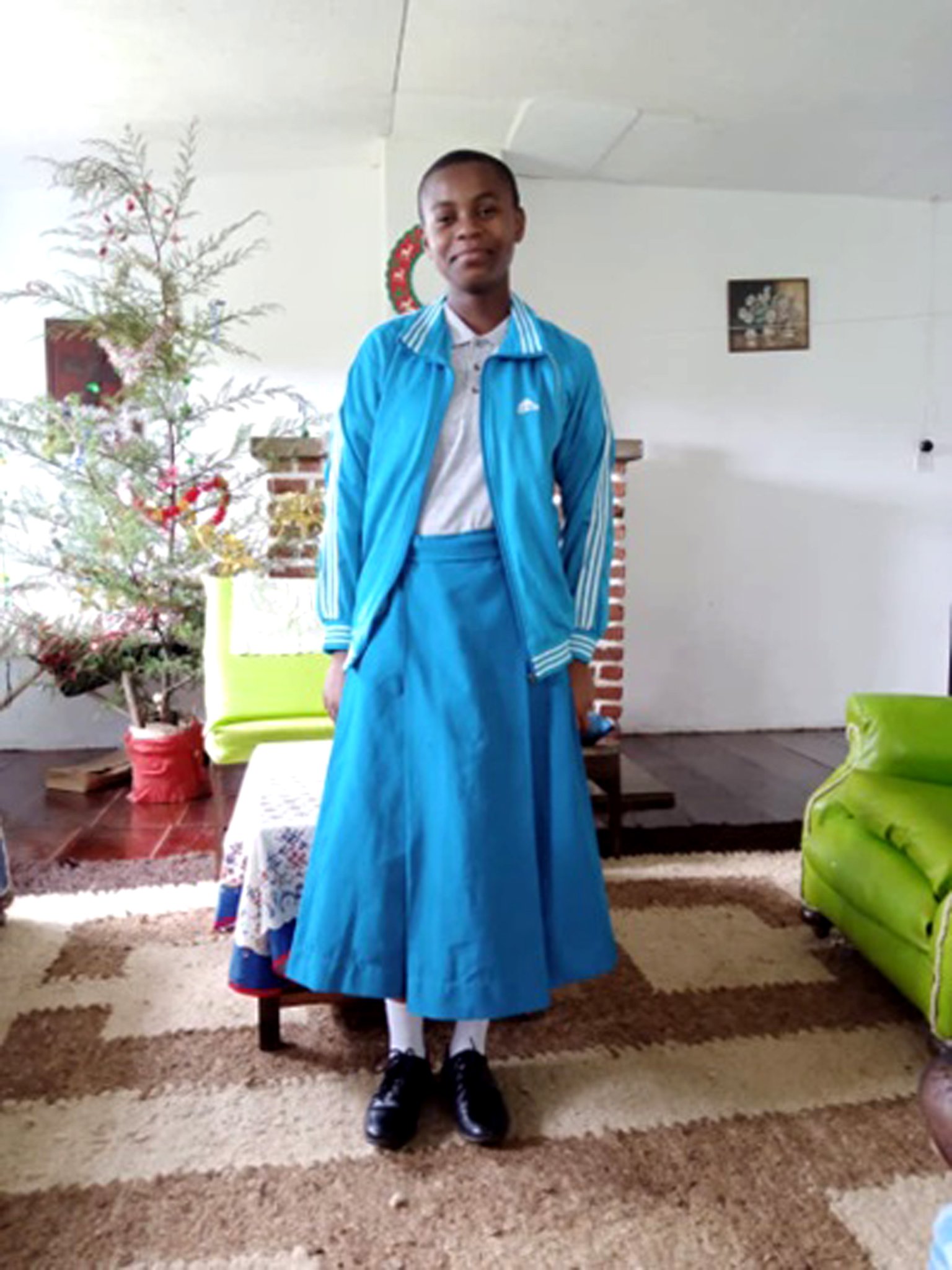 Tumaini in her St Catherine’s school uniform