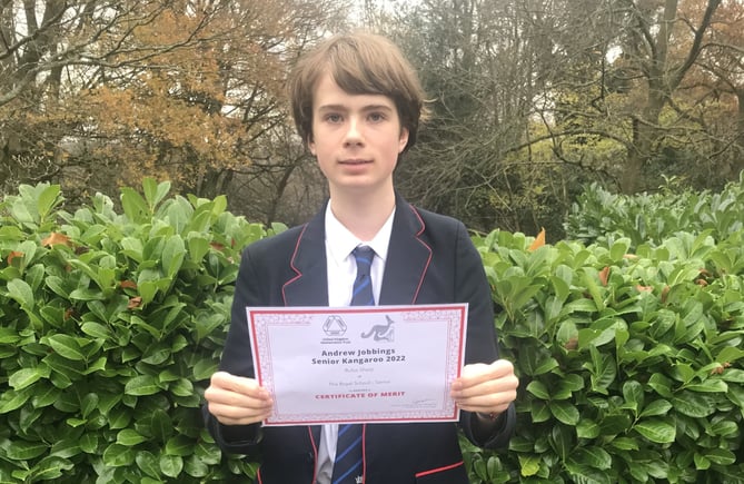 Royal School pupil Rufus Sharp with his merit certificate