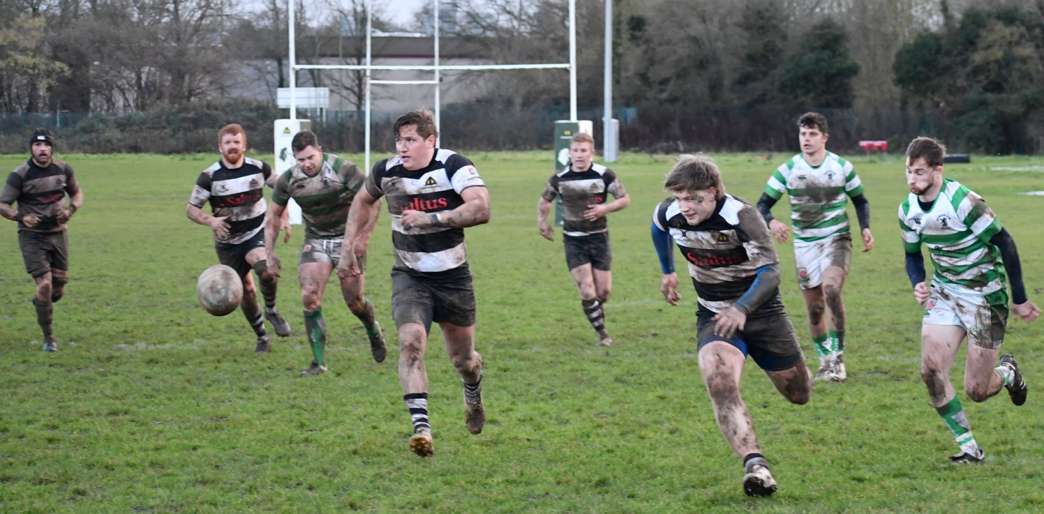 Max Williams runs for the line, supported by Tim Salmon