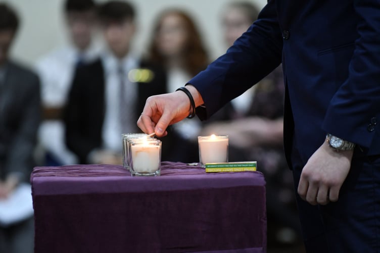 The Holocaust memorial service
high School students read passages about the 'Kindertransport' and light candles