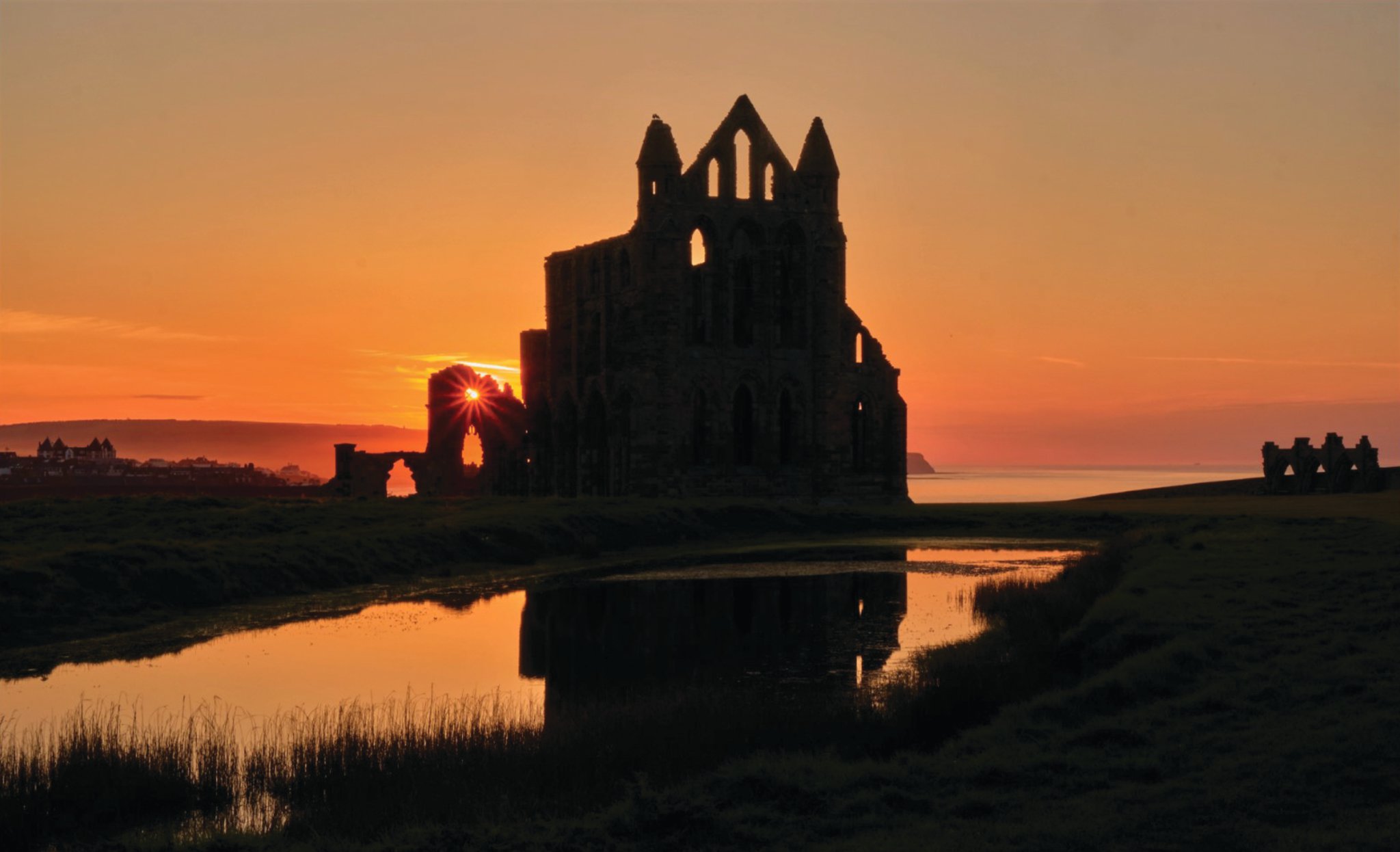 Sunset at Whitby Abbey, by Cath Ind.