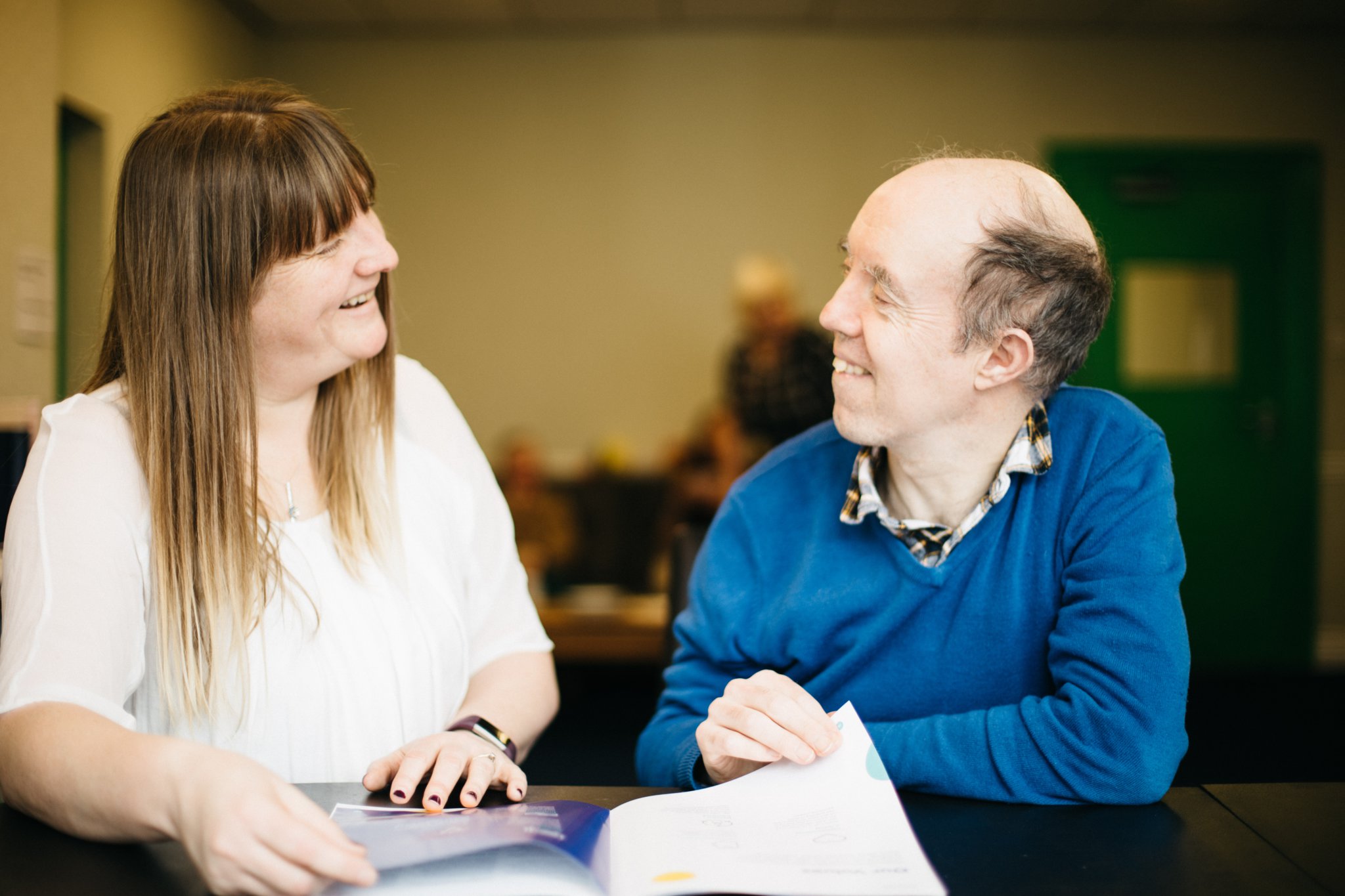 Head of operations Julie Ormond and attendee Phillip Corlett at Balleysleih Day Service