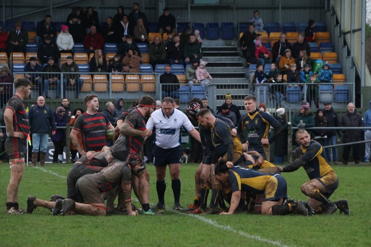 SCRUM TIME: Alton and Basingstoke get ready for a scrum
