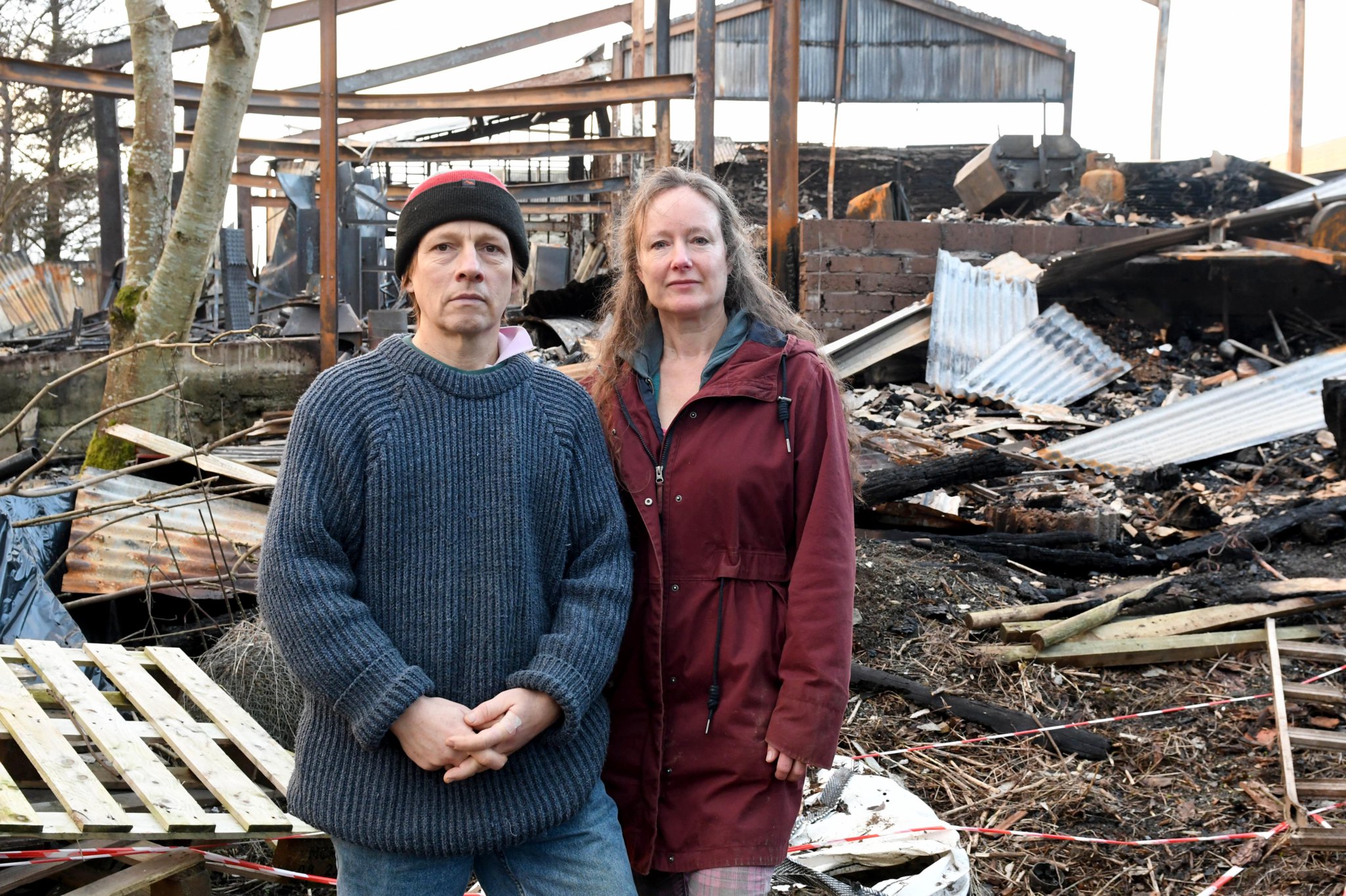 The aftermath of a barn fire at Staarvey farm - pictured is Stephen and Jenny Devereau