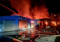 Firefighters battle flames at industrial units