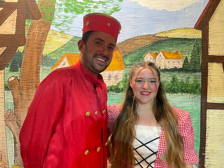 Cinderella played by Chloe Hawker and Buttons played by Craig Lambton.