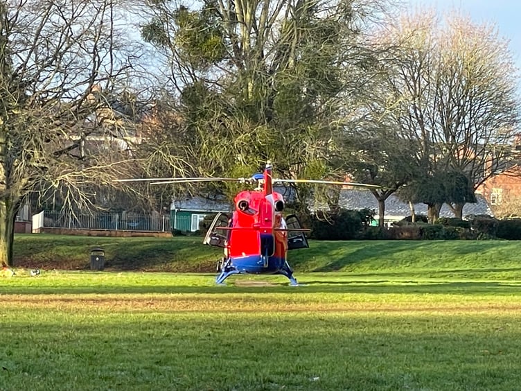 The Air Ambulance in Newcombes Meadow. AQ 2305
