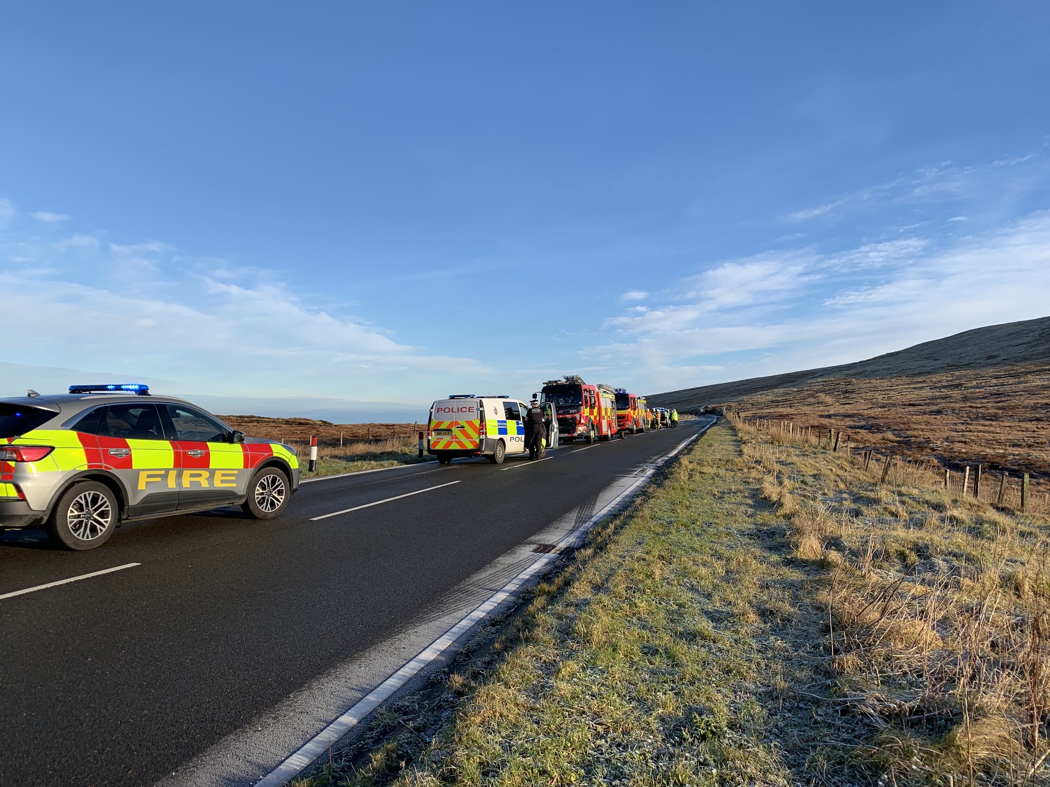 Fire service photograph from the scene after a car rolled on the Mountain Road near Black Hut
