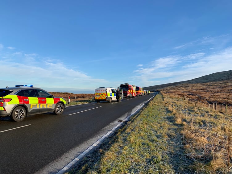 Fire service photograph from the scene after a car rolled on the Mountain Road near Black Hut