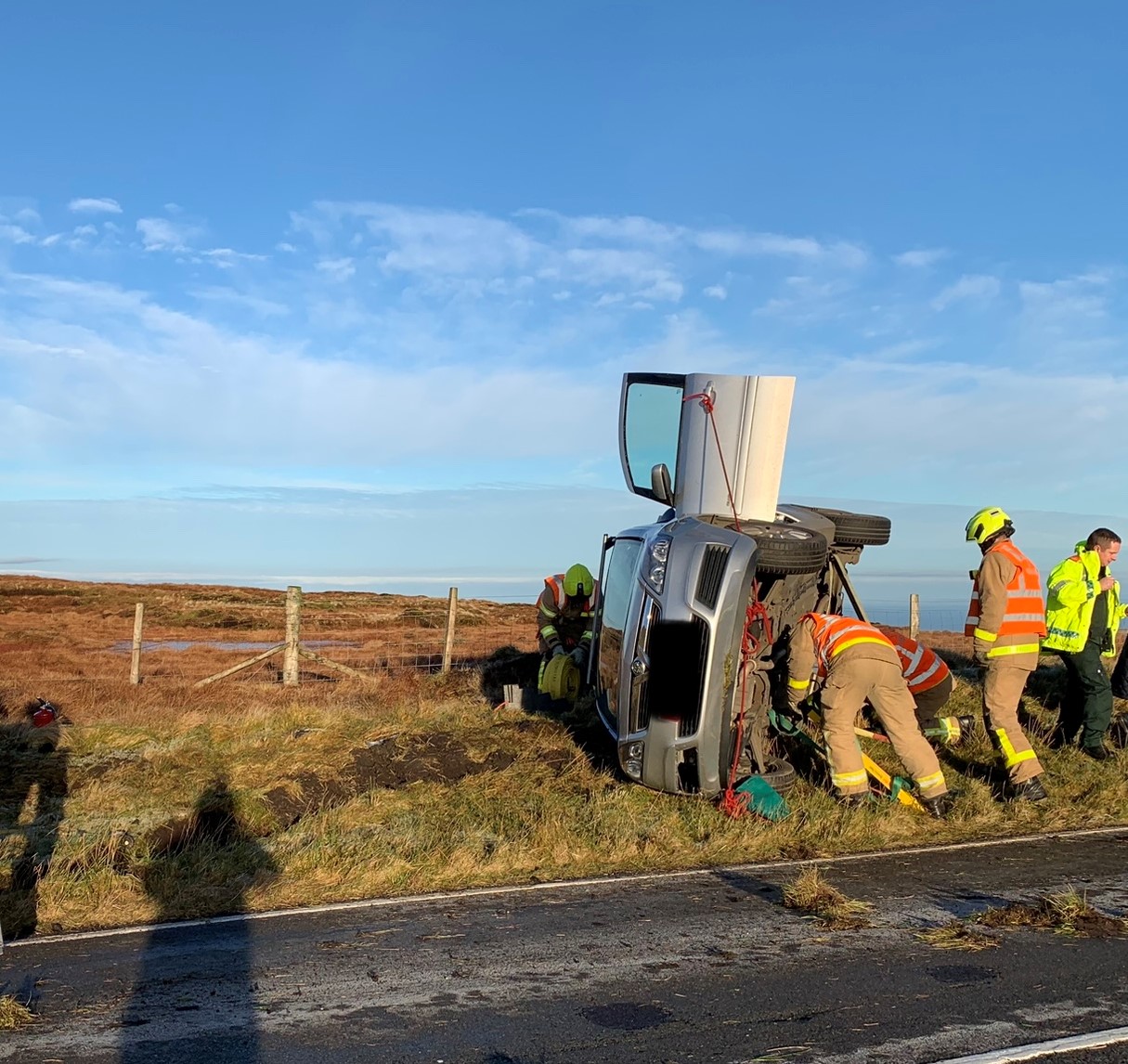 Fire service photograph from the scene after a car rolled on the Mountain Road near Black Hut