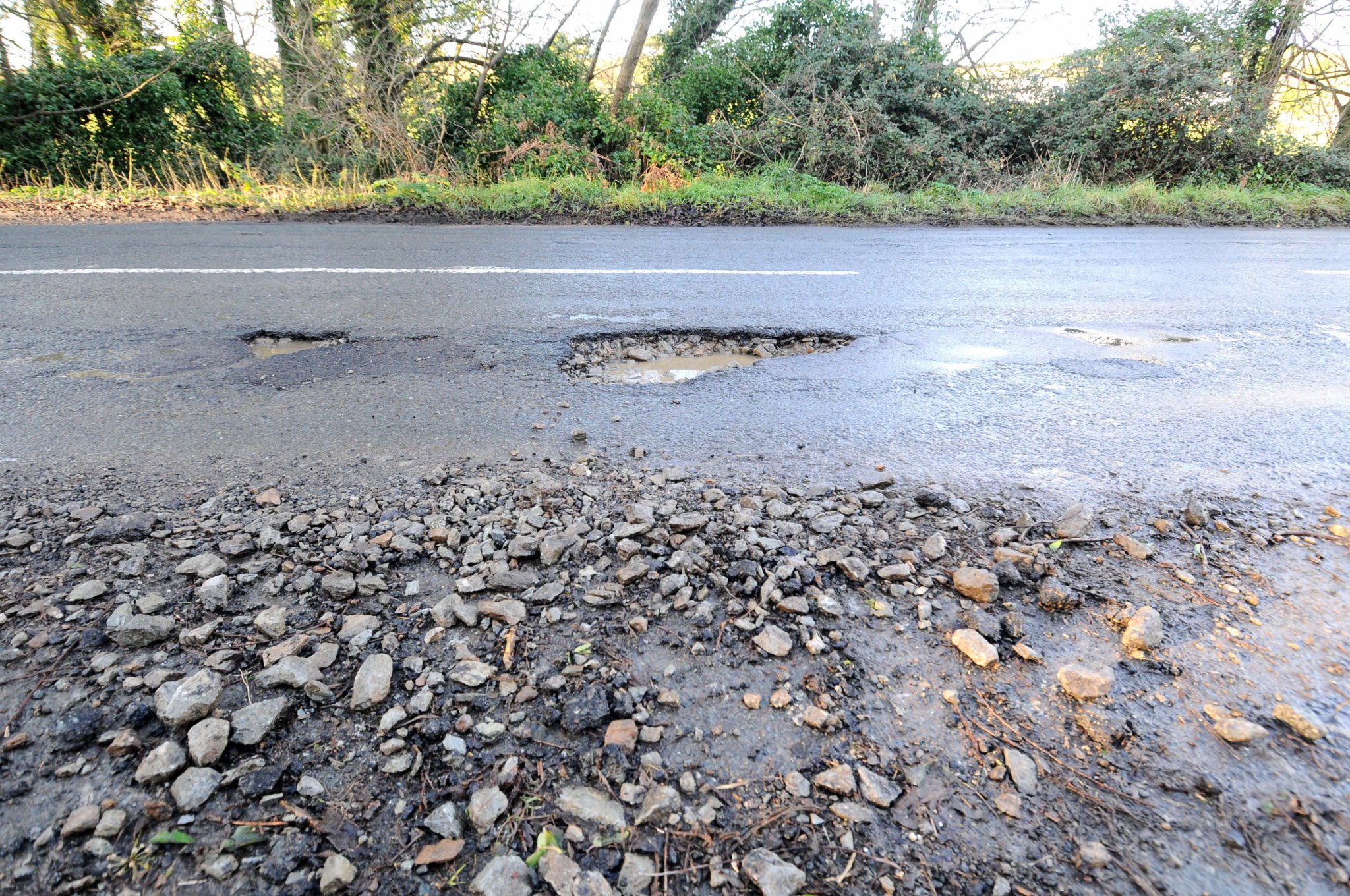 A pothole on the A10 road between Bride and Ramsey, at the junction with Lambhill Road -