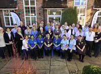 <p>A new photo of the present-day staff at Haslemere Hospital, which has grown since 1923 to provide a wide range of NHS services</p>
