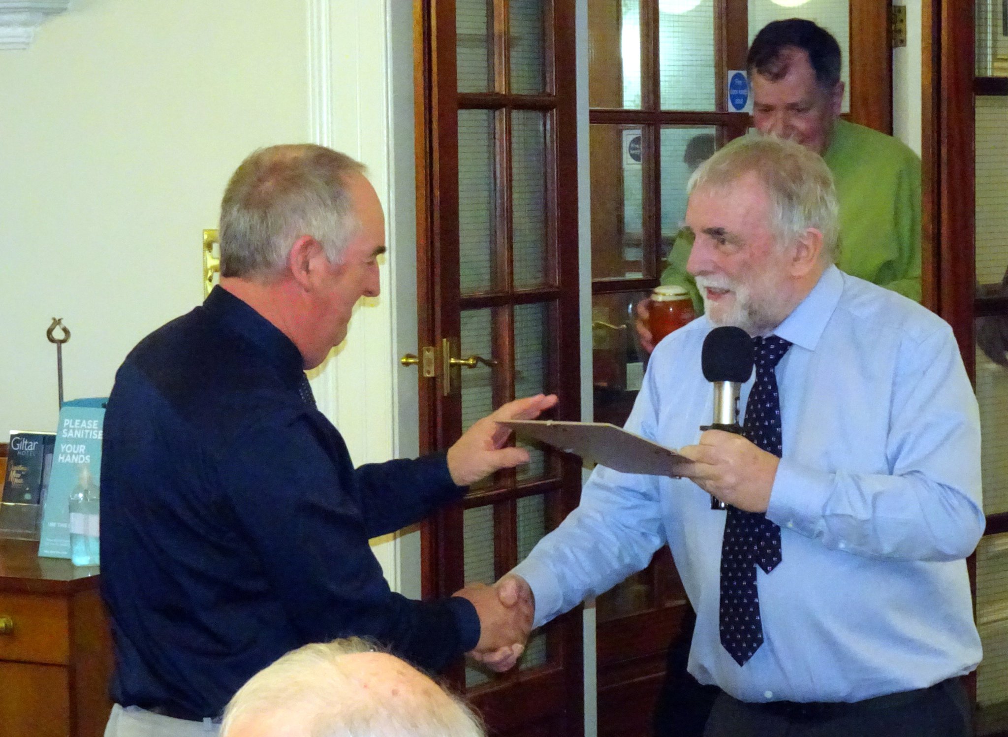 Baritone Kevin Morgan receives his 15Yr Service Award.